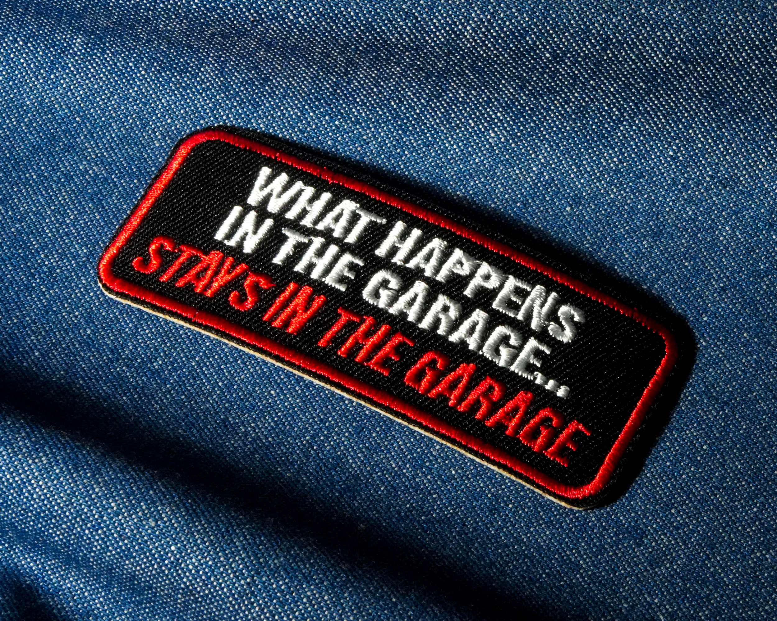 What Happens In The Garage Stays In The Garage Patch Iron On (9 x 3.5cm)